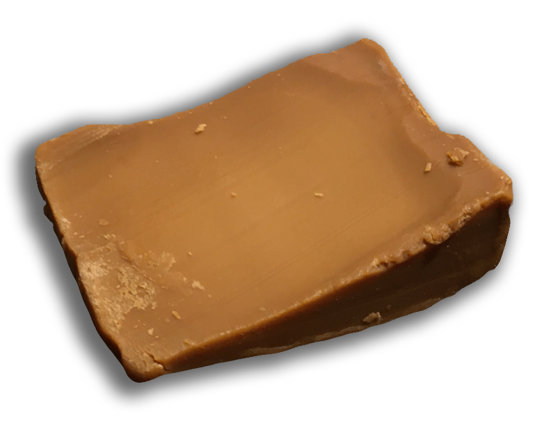 Image of a slice of Gjetost.
